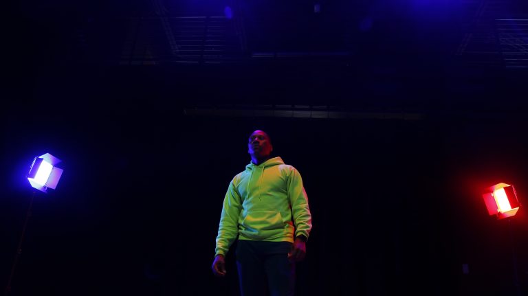 Person performing at Black Box Theatre